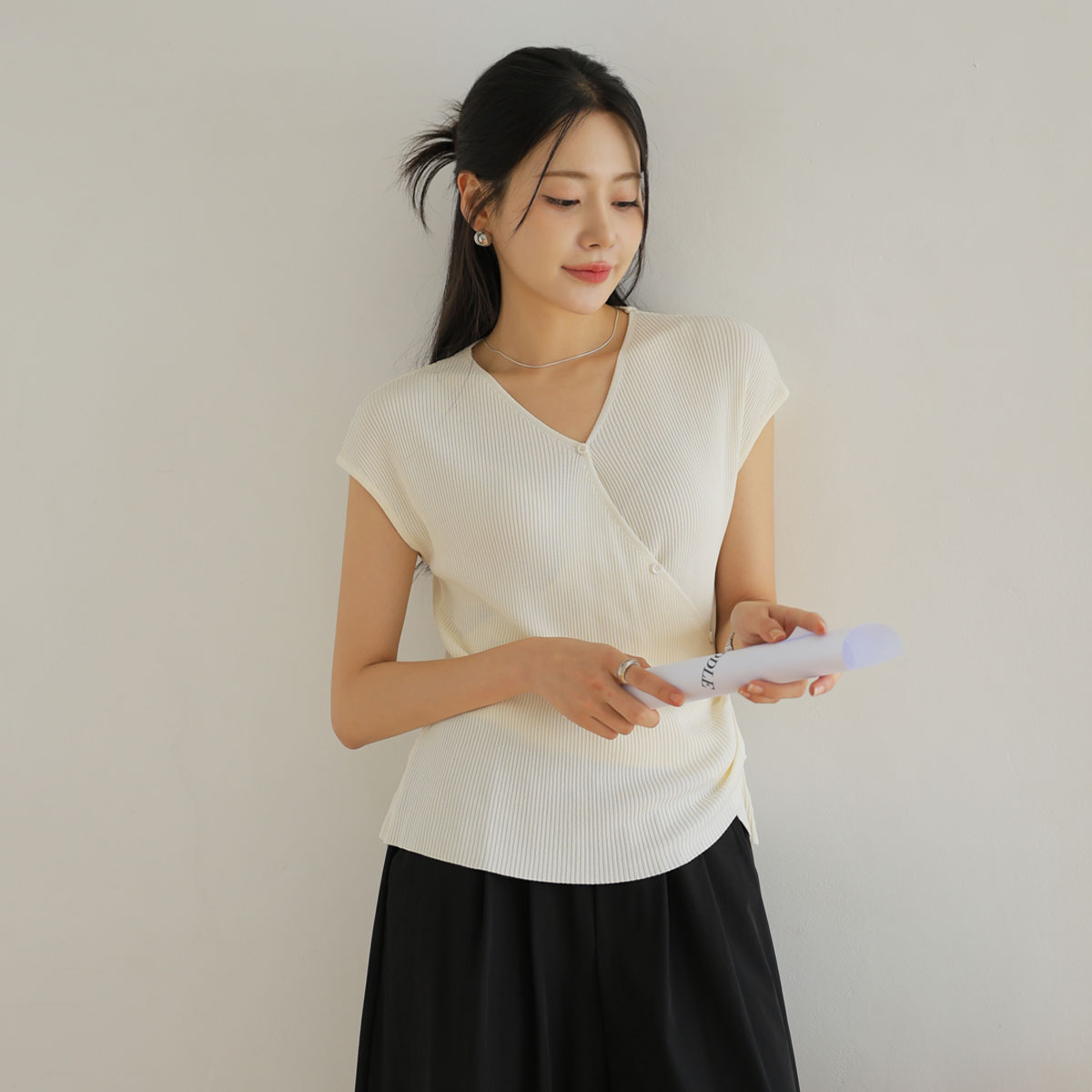 Cool diagonal button draping golf knit