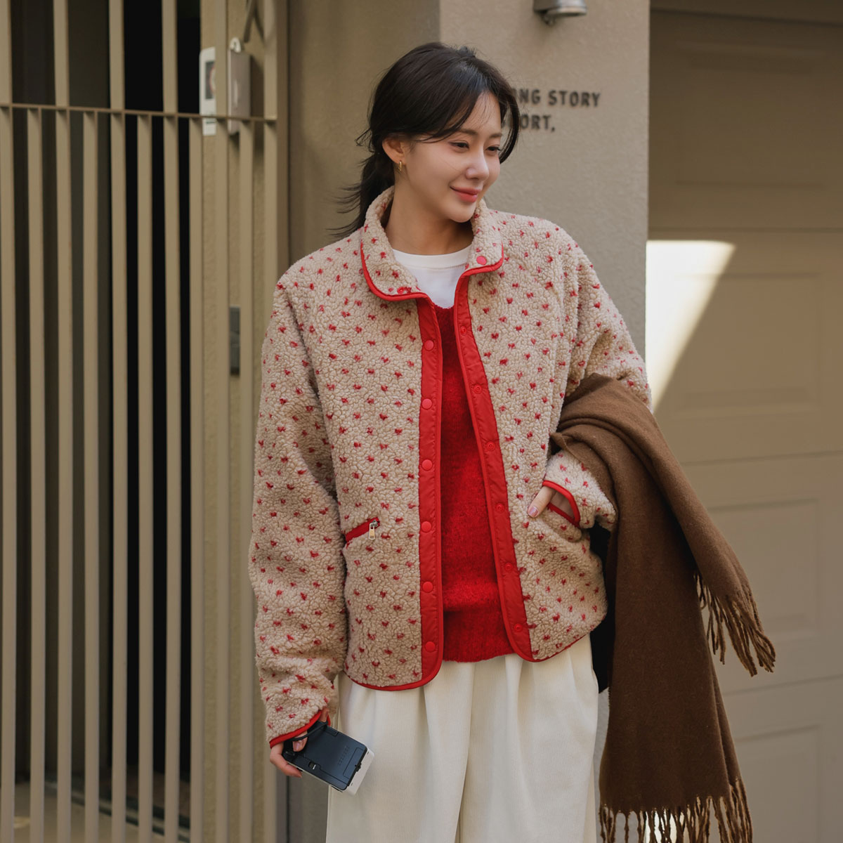 Poggle pattern reversible fleece jumper