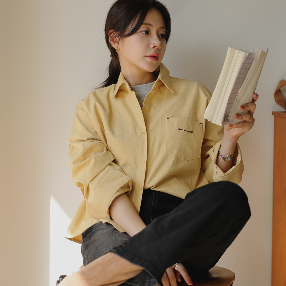 Font embroidered fleece shirt