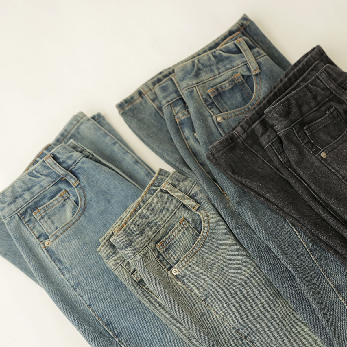 2TYPE Washed diagonal cut wide denim pants