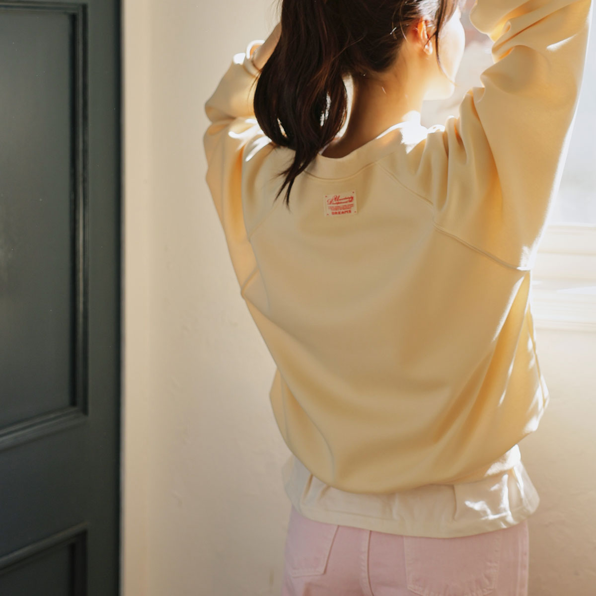 V-neck sweatshirt with back patch