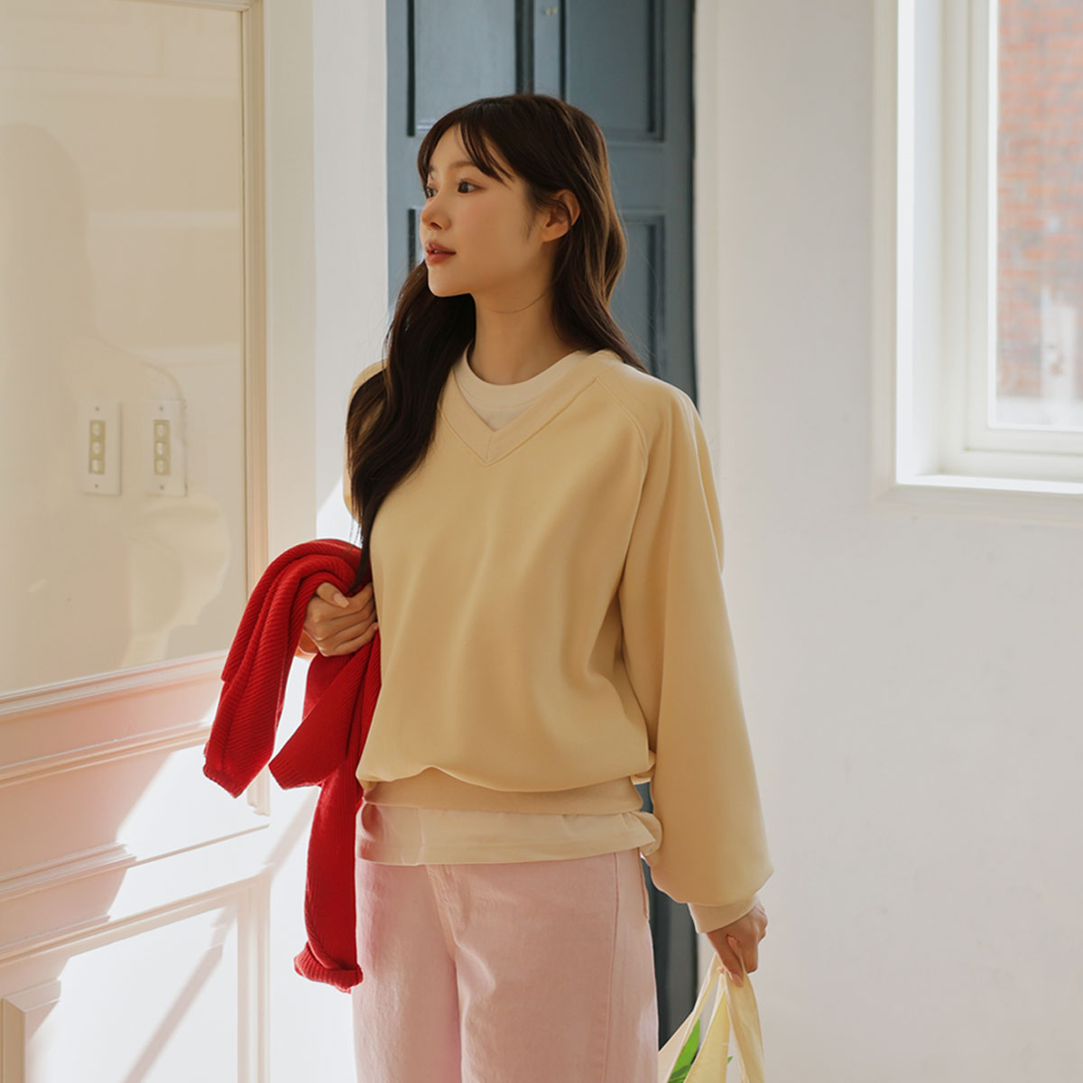 V-neck sweatshirt with back patch