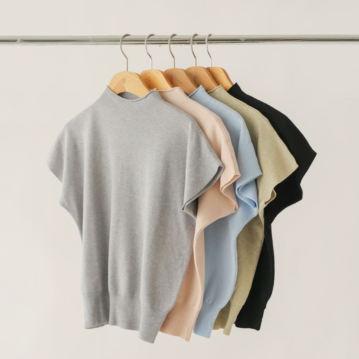 Soft cap-sleeve mock neck knit