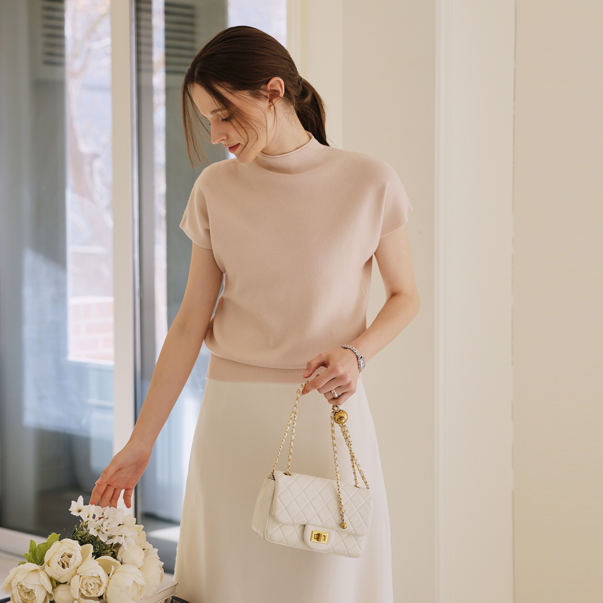 Soft cap-sleeve mock neck knit