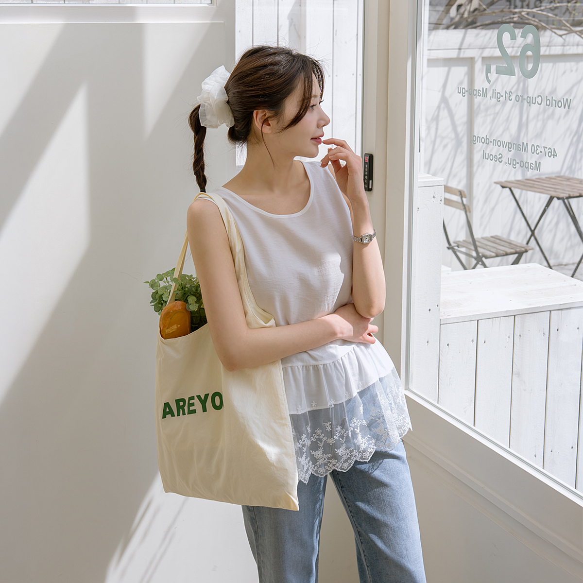 Lace-hemmed sleeveless top