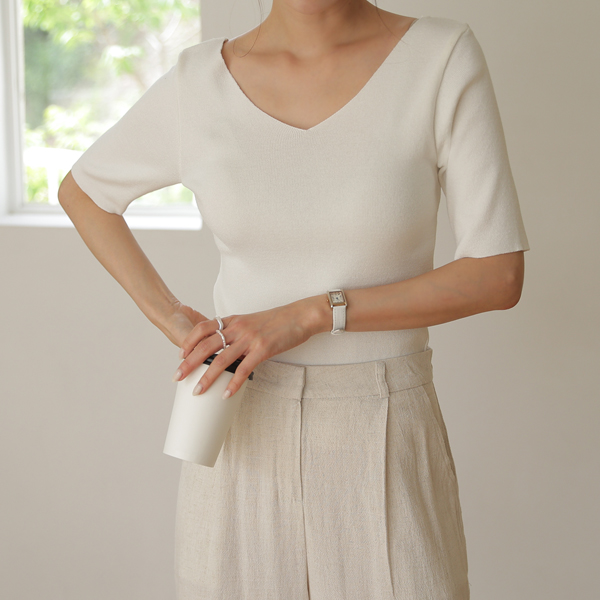 Reversible short-sleeved knit sweater that can be worn front or back