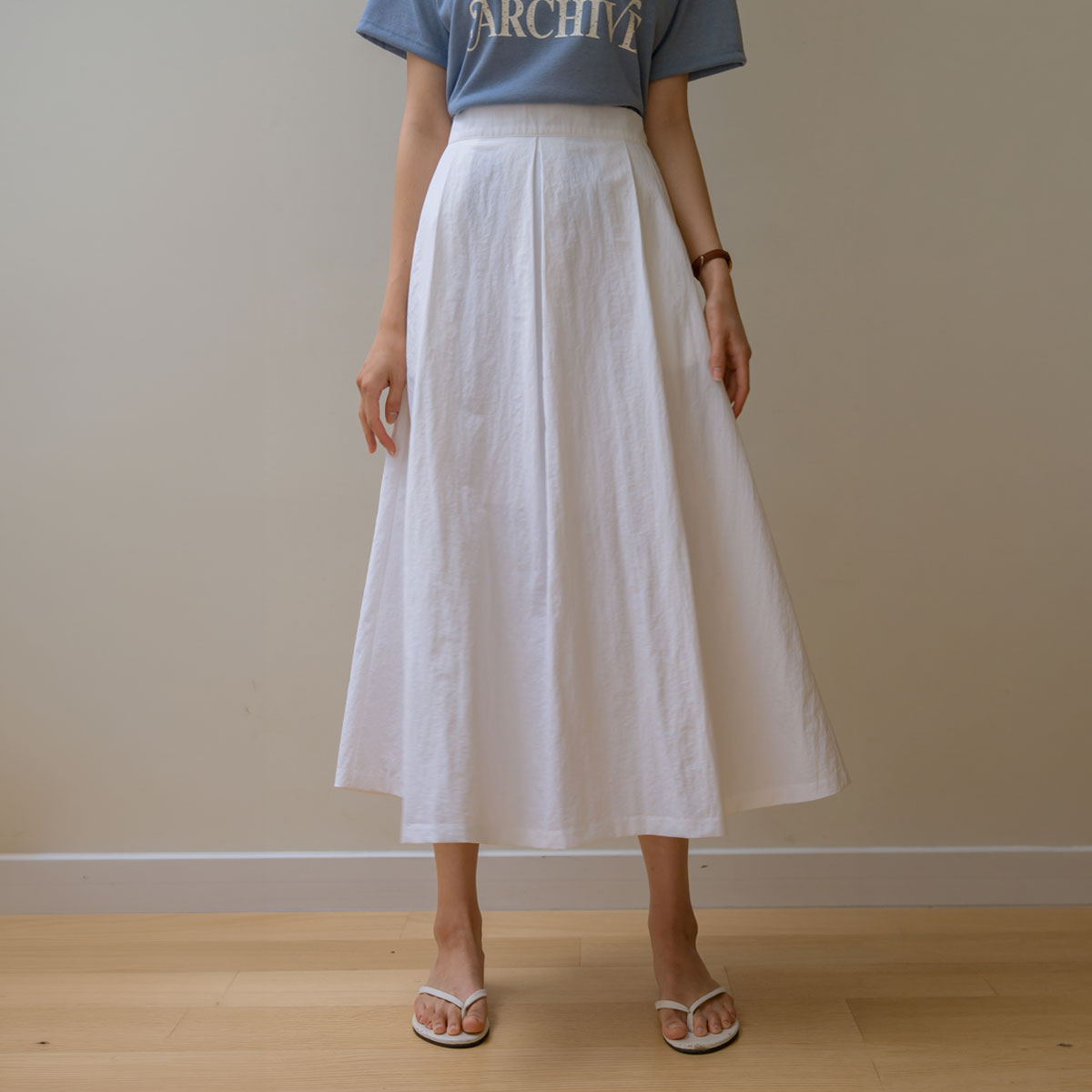 Rustling pintuck flare skirt